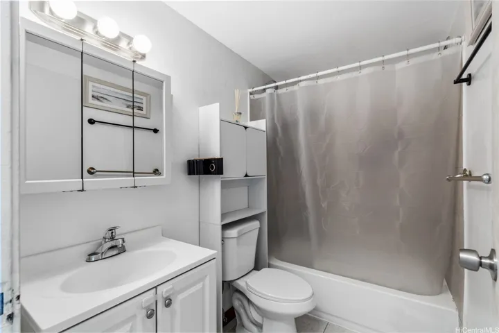 Full bathroom with practical everyday function.