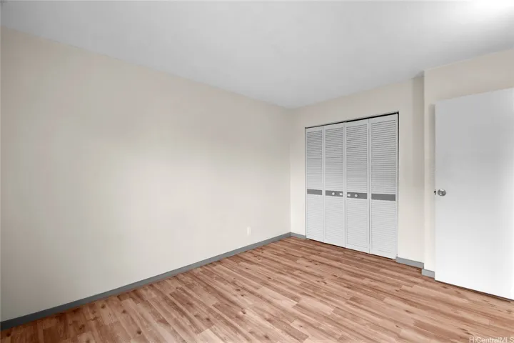 Additional bedroom angle with closet storage.