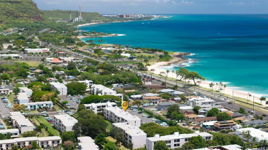 Aerial coastline view highlighting the nearby ocean lifestyle.