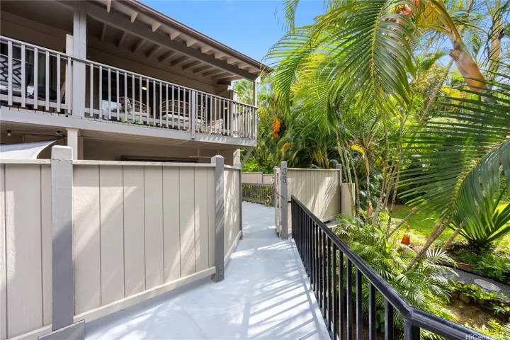 #35 is a corner end unit providing privacy amongst lush landscaping