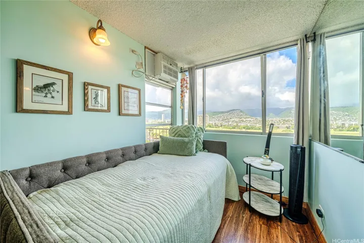 This living room area has drapes that can turn it into a private room overlooking amazing views.