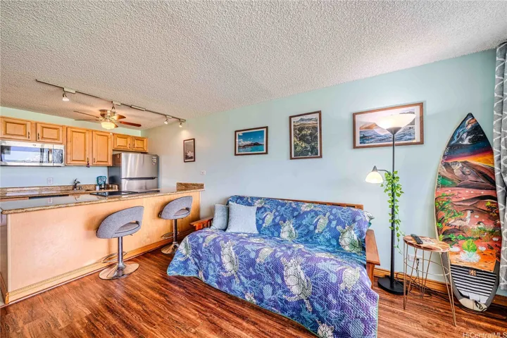 Spacious living room and a kitchen island.