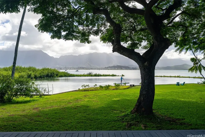 Experience island living from this premier vantage point, where you can watch paddlers and sailboats glide across the serene bay.