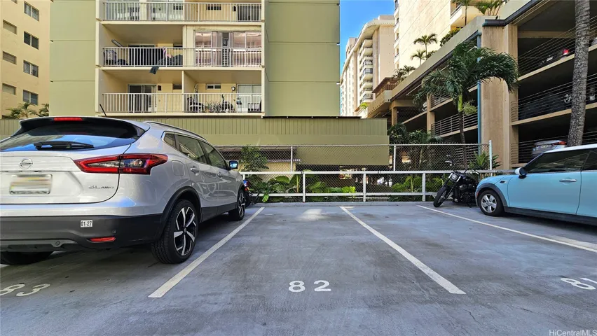 Parking stall #82 near the back entrance