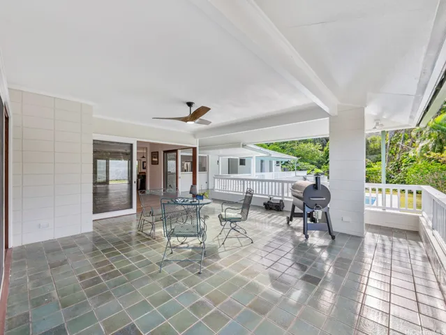 Entertainment area with pool below.