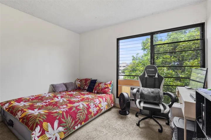 There is a window unit AC in each bedroom.