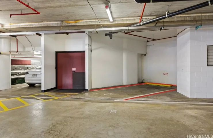 First stall go up those stairs in that Maroon door to your apartment