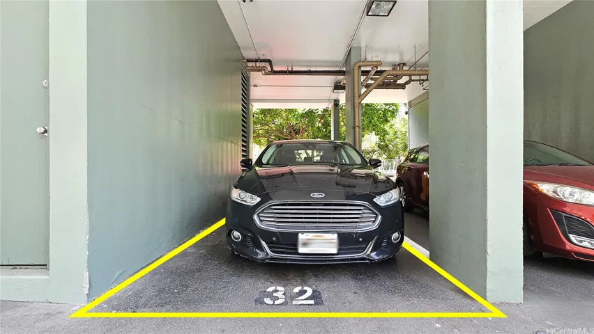 Covered parking stall
