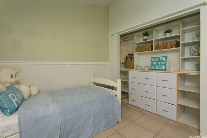 Spacious 2nd bedroom with Built in closet space .