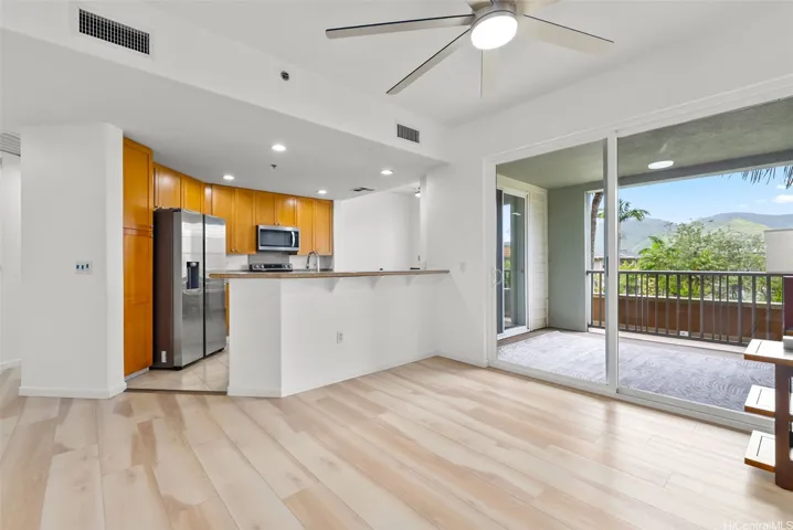 View of the kitchen and outdoor lanai from the living room.