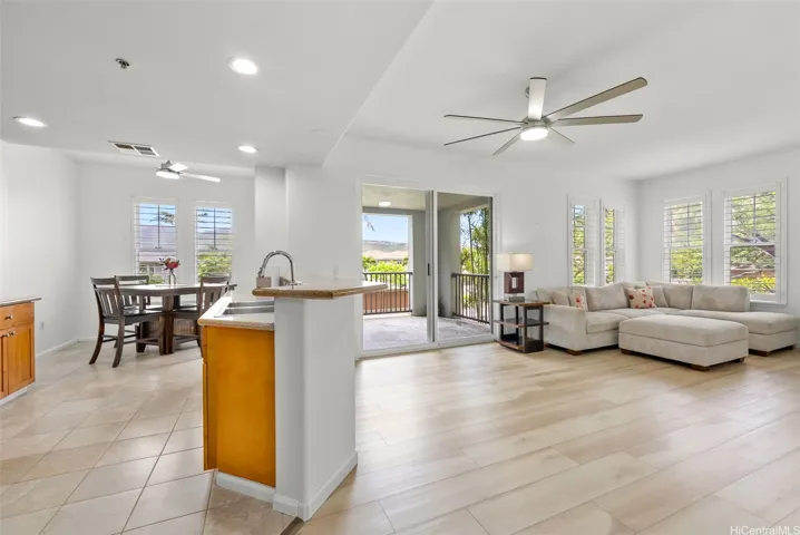 Full kitchen and living room view.
