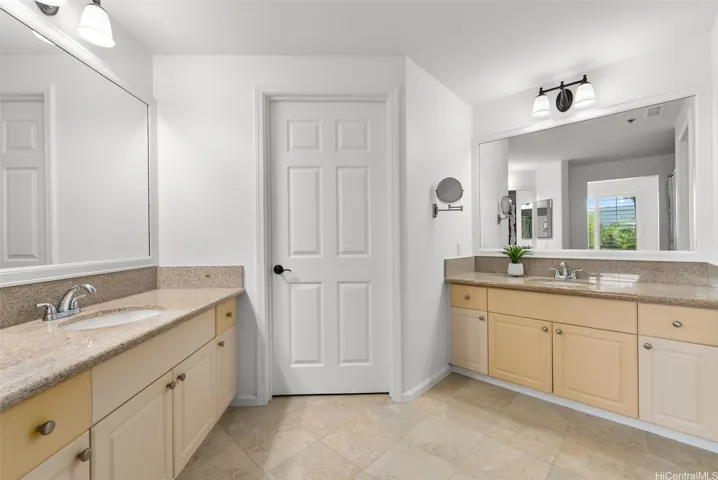 A large walk-in closet is accessible via the ensuite bathroom in the main bedroom.