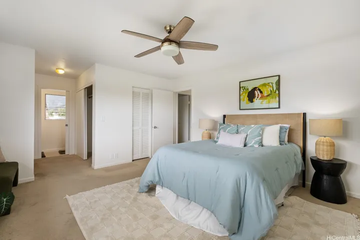 Upstairs prinary bedroom with half bath