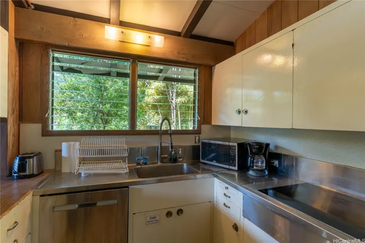 Kitchen is original but well taken care of and quite functional.