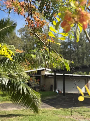 Country living in this 3 bedroom 2 bath home on 14,518 sq. ft. lot steps from the beach.