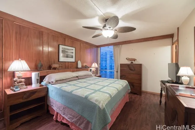 Master bedroom with King bed, dresser, nite stands