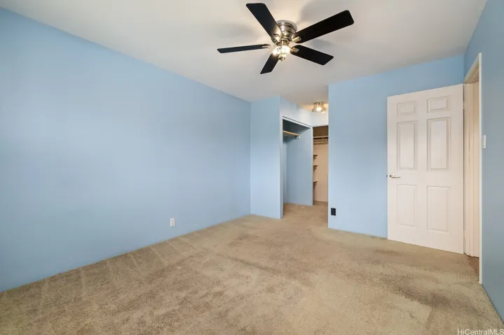 Two large open concept closet spaces.