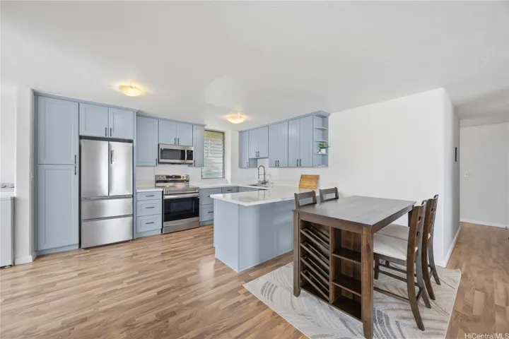 Bright kitchen and dining space offering both functionality and charm.