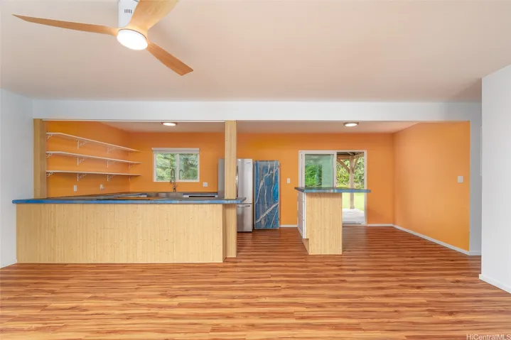 Recent updates include the popcorn ceiling removed and stylish new vinal flooring, giving this space a fresh, modern fee.  The open layout and airy atmosphere make this living area both comfortable and welcoming for everyday living
