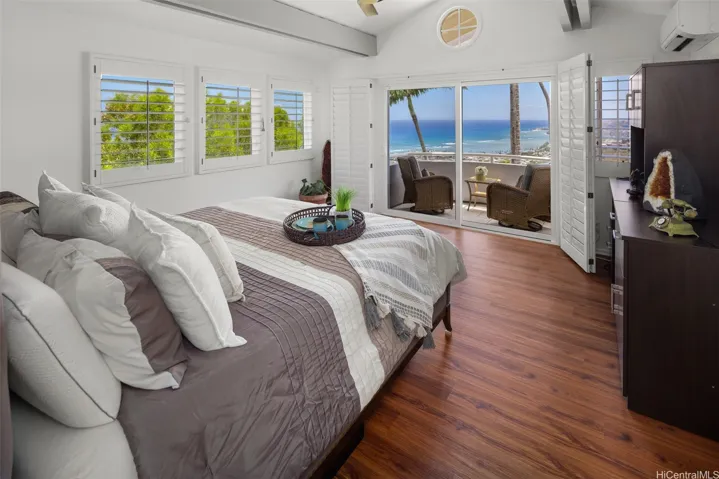 The Primary Suite includes a high ceiling, a private lanai, an en-suite bathroom, AC, and a large walk-in closet.