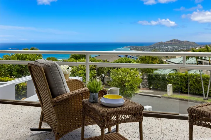 Enjoy the scenic views while dining or relaxing on this front lanai.