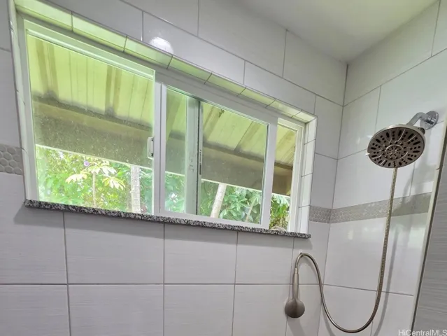 Bathroom window allows for natural light and fresh island breezes.
