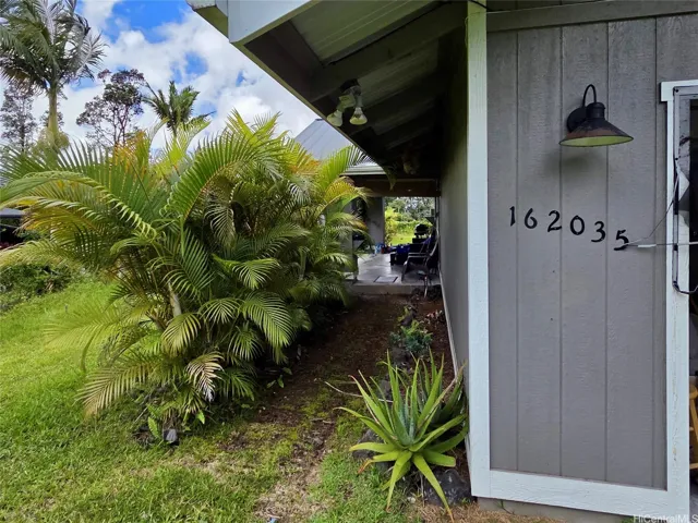 Covered entryway provides a welcoming arrival and protection from the elements.