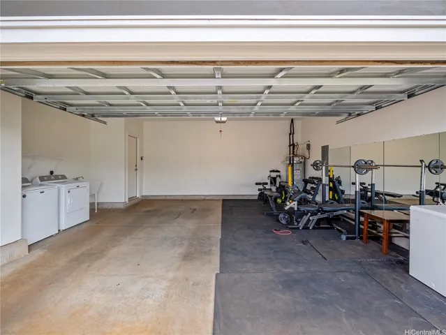 Spacious garage. Solar hot water heater included.