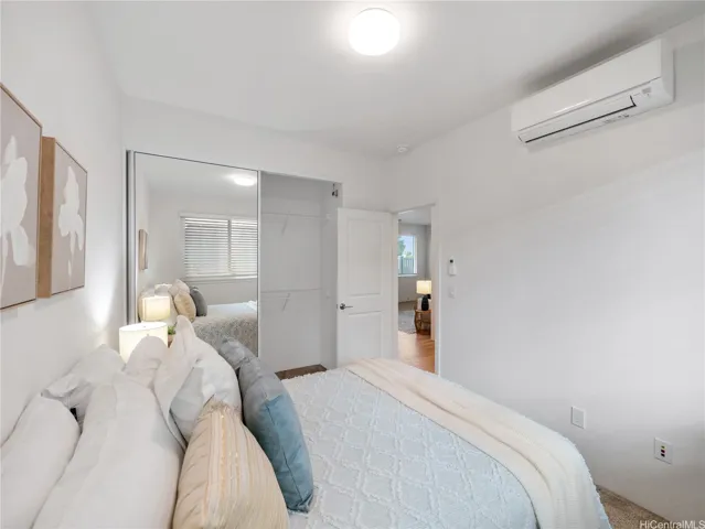 Bedroom #3 features a split A/C, providing cool and comfortable personal space.