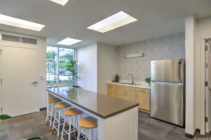 The Lounge - it has a refrigerator and sink.