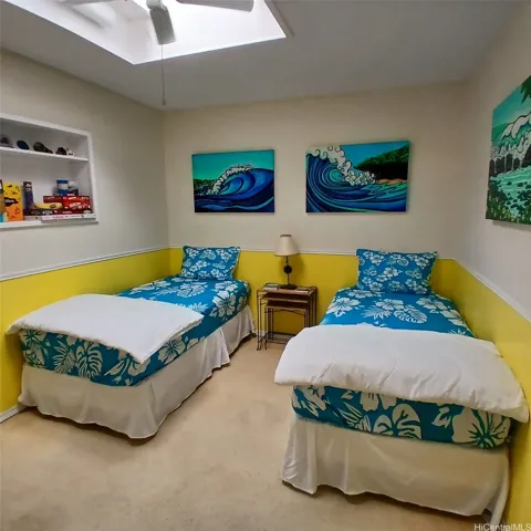 Bedroom 3 is actually "the den" (skylight doesn't count as a window).