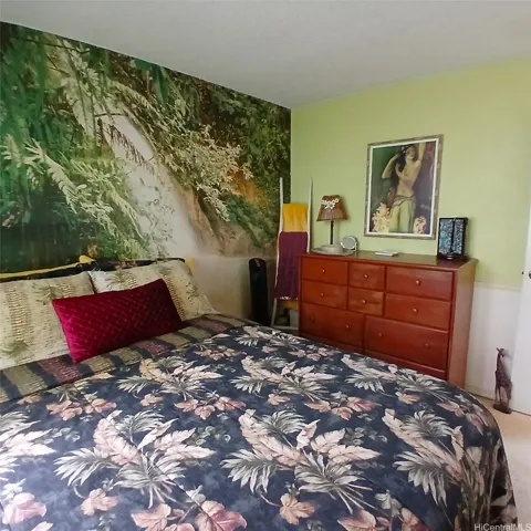 Bedroom 2 can fit a queen bed or smaller.