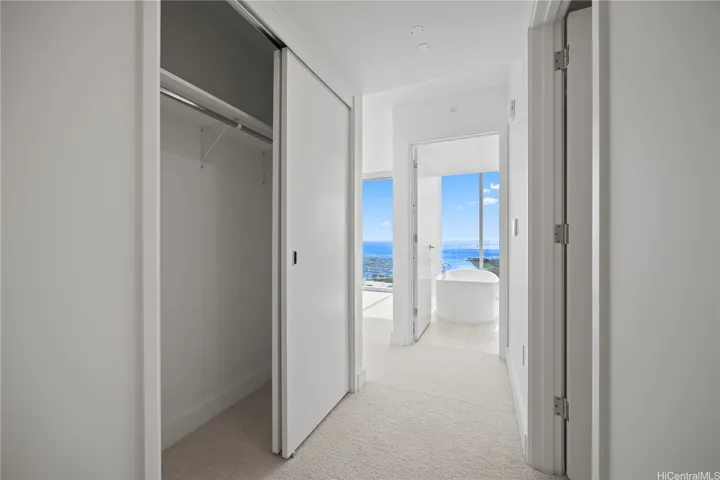 entry to primary bedroom/bathroom
