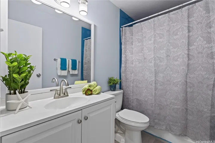 Bathroom re-piping was completed in March. New sink, vanity, toilet, lighting fixtures and hardware. Shower walls were able to be put back after re-piping.