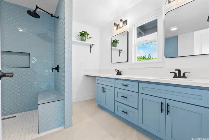Primary Bathroom with Custom Tile work in Spacious Shower