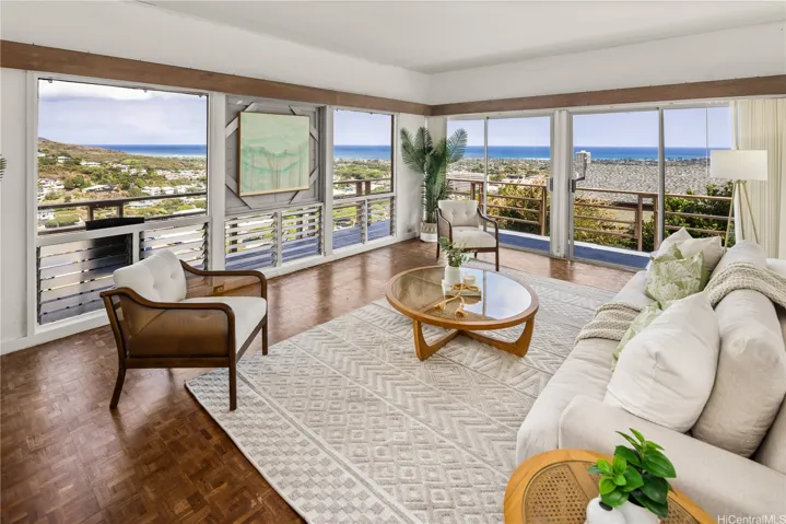 Grand-sized Living Room with the backdrop of the beckoning Pacific Ocean.