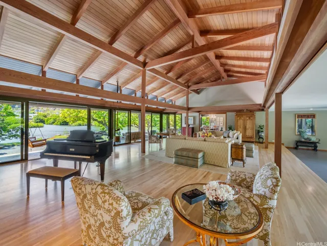 Large rooms with walls of windows for expansive views and wildlife.