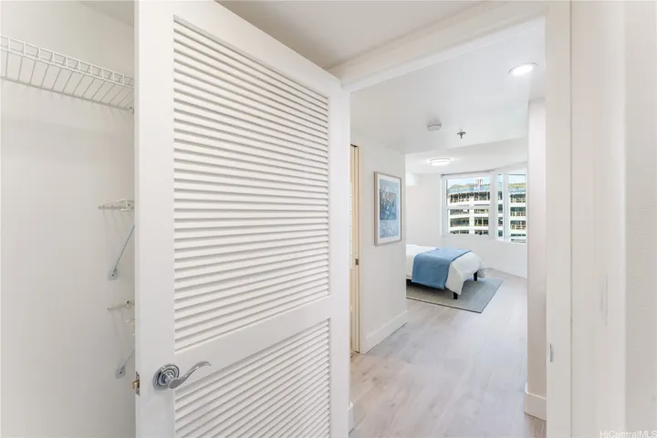 Primary bedroom walk-in closet
