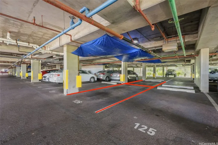 Covered tandem parking stalls
*Enhanced*