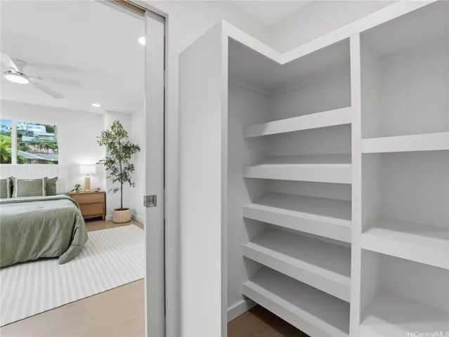 Walk-in closet w/ custom built-ins