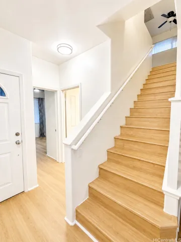 Front entry by stairs