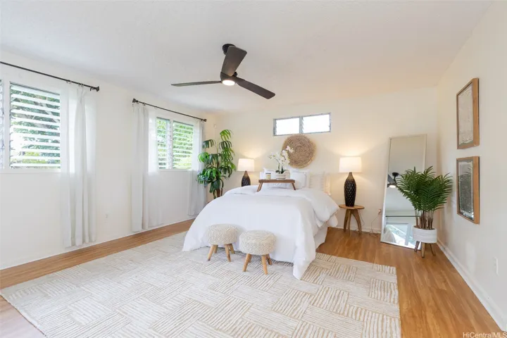 Light and bright primary bedroom opens up to backyard!