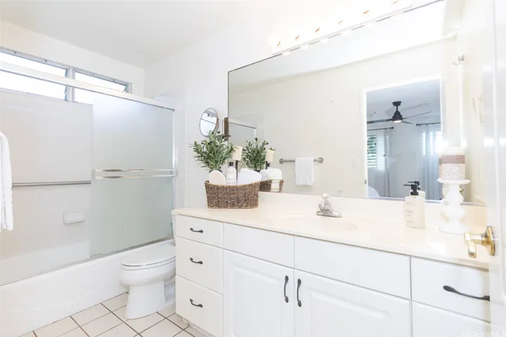 Primary bathroom with plenty of counter space and bathtub.