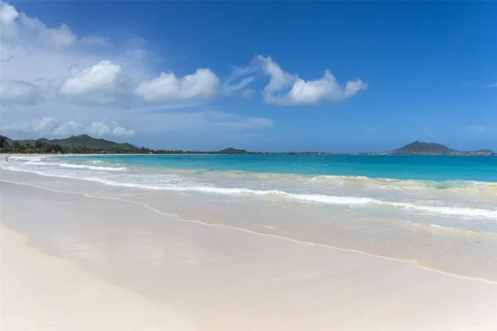 Soft white sand and crystal blue water.  People dream of this Beach! Great for swimming, morning sun rise walks and evening strolls!