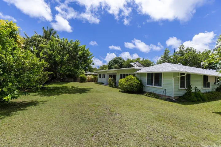 Expansive back yard looking towards the home. The possibilities are endless!