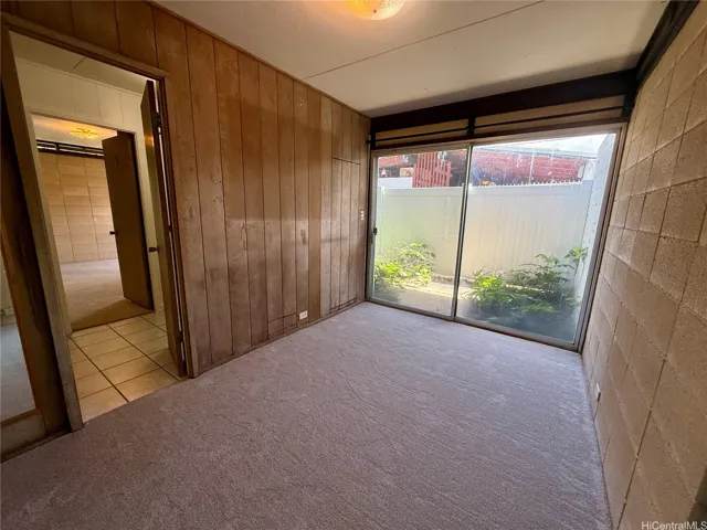 Bedroom 2 with access to shared patio
