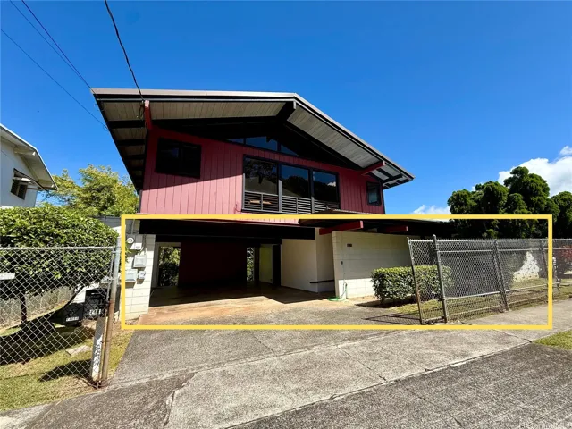 Exterior view of the downstairs unit and its separate entrance.