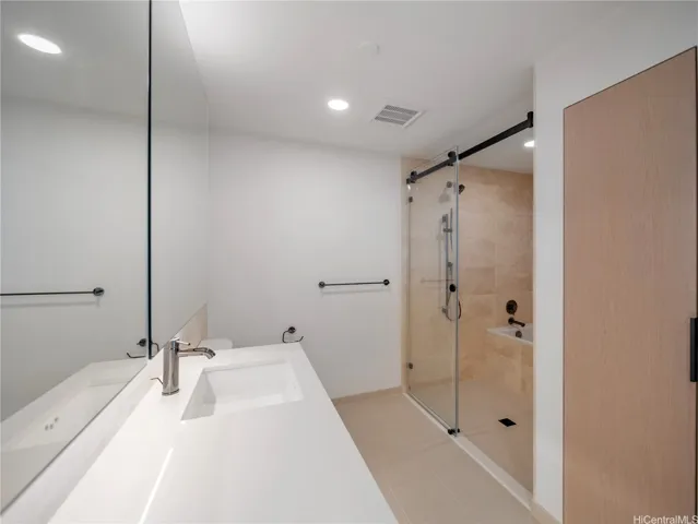 Double vanities and walk-in shower!