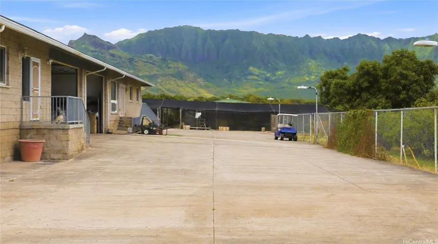 8” concrete driveway with industrial street lights and mountain views
