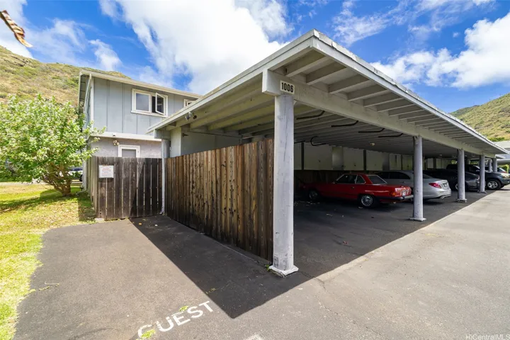 A convenient guest parking is stall next to your carport.
